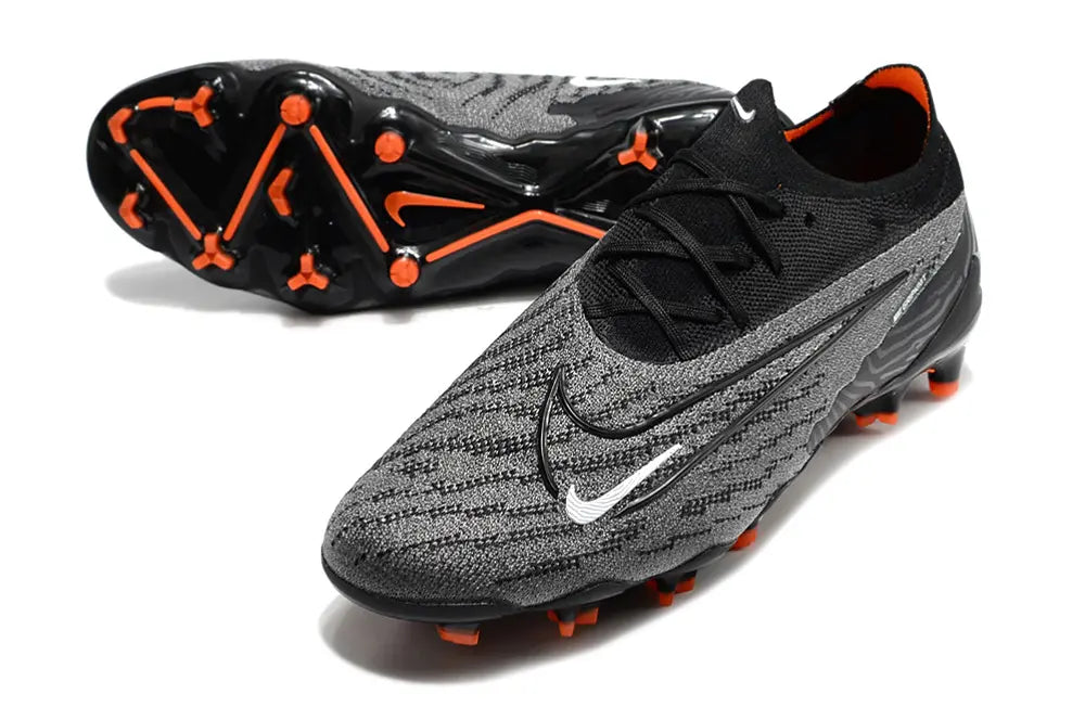Phantom GX DF Low Elite Noir/Orange (FG) Bonplancrampons