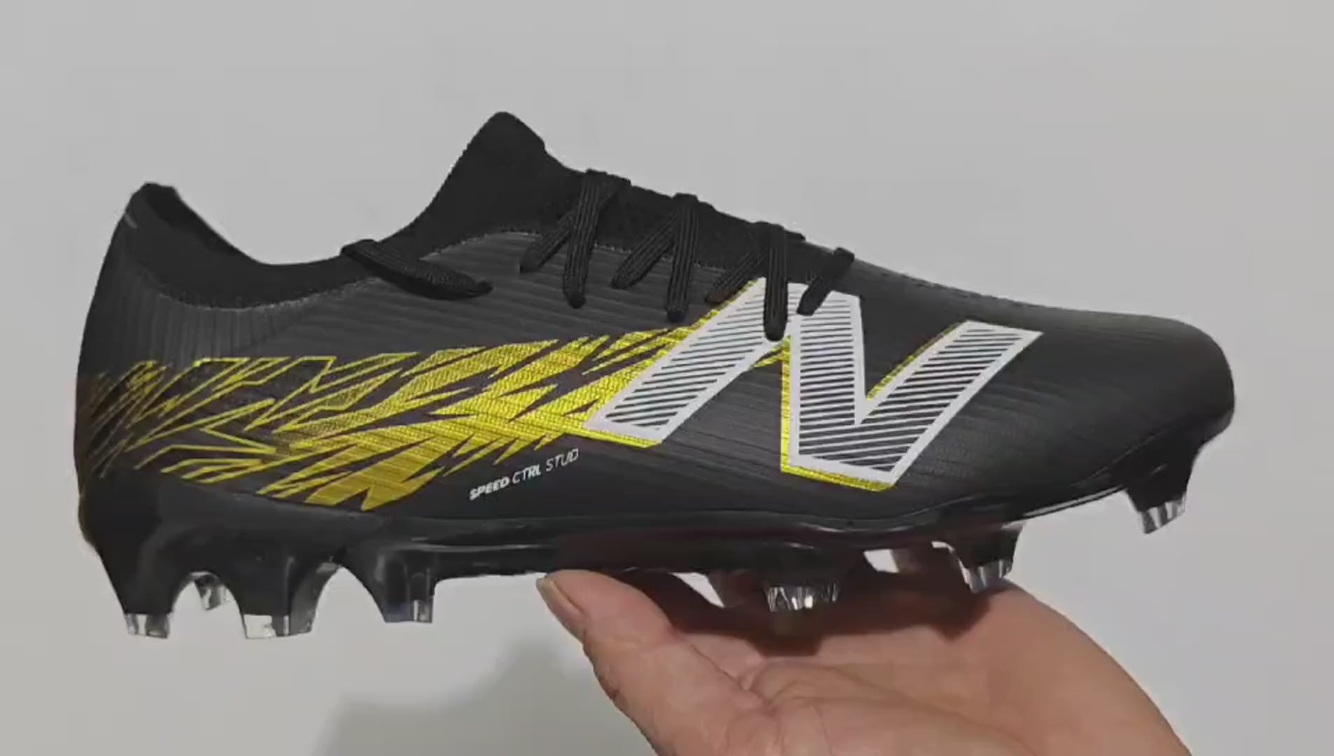 New Balance FURON TEAM V8 Elite Noir/Doré (FG)